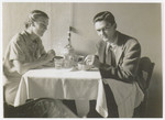 Roswell and Marjorie McClelland sit for a meal in Rome where they were opening an American Friends Service Committee Office.