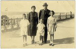The Joshua family walks by the beach in Scheveningen where they had fled from Germany.