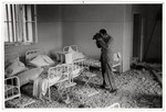 Film maker and photographer Julien Bryan films the destruction of one of Warsaw's largest hospitals: the Catholic Hospital of the Transfiguration.
