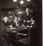 At home in the Weinlaub's parlor in Hannover, two Jewish families get together for bridge .