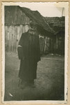Portrait of a beared Jewish man with a cane in Deblin-Irena.