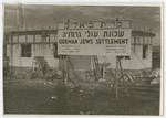 View of the sign announcing the construction of Kiryat Bialik, a new settlement for German Jews.