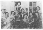 Group portrait of relatives of Stefania Ungar in her parents' home in Bolchowka.