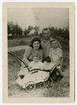 The Blotnick family poses outside in the Pocking displaced persons camp.