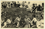 Children [probably from the Lindenfels camp] rest on the lawn during an excursion to Koenigstein Castle.
