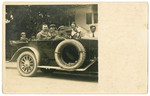 The Landman family goes for a car ride in its first automobile.