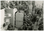 American troops gather on deck on their return to the United States.