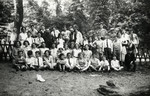 Group portrait of children from the Amsterdam Jewish school, taken during a class outing.