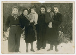Group portrait of women, two of whom are holding their babies in the Eschwege displaced persons camp.