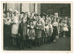 Possibly the class of Doris Edelman (nee Tager) celebrating the Jewish holiday of Purim in Germany.