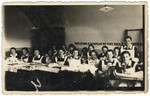High school class photograph of young women in Zamosc, Poland.