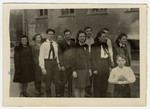 A group of young displaced persons (many wearing Zionist uniforms) stand in formation at the Eschwege displaced persons' camp.