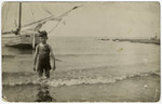 Louis Moses wades in the sea in prewar Netherlands.