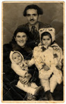 Postwar family portrait of the Virtgaym family.

Pictured are Yevgeniy and Rozaliya Virtgaym and their two daughters Eva and Susan.