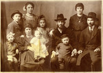 Studio portrait of the Freimowitz family.

Pictured from right to left are Zalman Dub, his wife Raizel Dub (sister of Bertha Freimowitz), Ferenz Freimowitz with Alex, Frida Freimowitz, Bertha Freimowitz holding her daughter Esther, Rachel Freimowitz, Morris Freimowitz and Goldie Freimowitz.