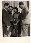 Four Jewish refugees gather in Nazi occupied France.