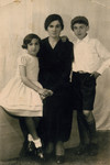Studio portrait of Malka Leah Suesskind and her two children David and Tauba.