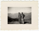Austrian Jewish refugees, Franz Edelshein and Schwartz, pose with the Alps in the background in southern France.