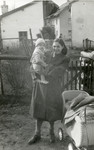 Lea Sheindla Leiblich holding her son, Tuvia Erlich, in the Eggenfelden displaced persons camp.