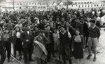 Jewish displaced persons gather at La Spezia harbor where they are conducting a hunger strike to garner support for their desire to immigrate to Palestine.