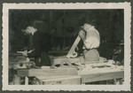 Two teenage boys work in a carpentry workshop in a Zionist children's home in Switzerland.