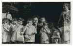 Young children from the Lindenfels home enjoy an outdoor snack.