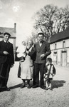 The Michel family poses on a street in Epernay prior to fleeing to the Free Zone.