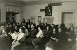 Jewish youth gather for a meeting with a member of the Haganna in the Kloster Indersdorf children's home.