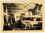Interior view of the sleeping quarters of hut 41/1 in the Kitchener refugee camp.