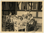 Young children attend a party.

Among those pictured are Gerald Liebenau (front left) and his mother Helene (standing far right).