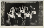 Prisoners put on a musical performance at the Novaky labor camp.