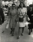Denise Caraco and her friend Simone Lougassy walk on the Canebiere in Marseilles.