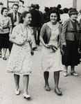 Denise Caraco and her friend Jacqueline Hauser, both members of the Jewish Scouts group, walk on the Canebiere, in Marseilles.