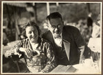 A German Jewish couple poses in an outdoor cafe.

Pictured are Dr.