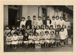 Class portrait of a kindergarten in Paris.

Among those pictured is Stephanie Bujakowski (second row, sixth from the left).