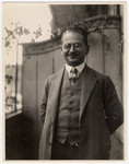 Close-up portrait of Dr. Hans Adolf Bujakowski on the balcony of his apartment.