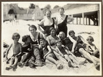 Three German-Jewish families relax on a beach in Heringsdorf on the Baltic Sea.