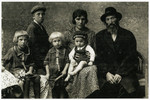 Prewar studio portrait of the Berkowitz family.

Pictured from left to right:  Toby, a stepbrother who died before the war, Leah, Fradel, Herschel (seated on her lap) and Eliyahu.