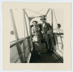 Betty and Rudi Cohen stand on the gangplank of the ship taking them to the United States.