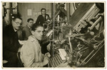 Workers operate the presses of the Goldstuecker printing press owned and operated by the Gero family.