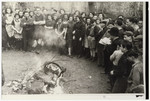 Jewish youth burn chametz [leavened bread] in preparation for the Passover holiday.
