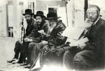 Group portrait of Hassidic Jewish men.

Chaim Braunfeld is pictured on the far left.