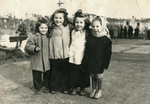 Clara poses with three other little girls at the Schlachtensee displaced persons camp.