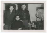 David Rosenzweig poses with his two cousins Ben and Joe Rosenzweig in their apartment in the Bergen-Belsen displaced persons camp.
