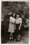 Sara (right) poses in the Gabersee displaced persons camp with her friend Amy.