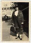 Ruth Rappaport's mother poses on the street by "Thomas Church" in Leipzig.