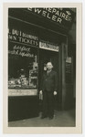 Erich Tauscher stands outside his watch and jewelry store.