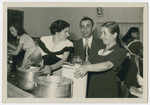 Jewish immigrants to Costa Rica serve food at a wedding of survivors from Zelechow.