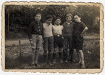 Group portrait of five boys in the Chateau des Morelles childrens' home.