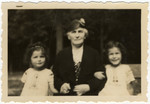 Jacqueline (left) and Manuela Mendels (right) go for a walk with their paternal grandmother, Thekla Marx Mendels.